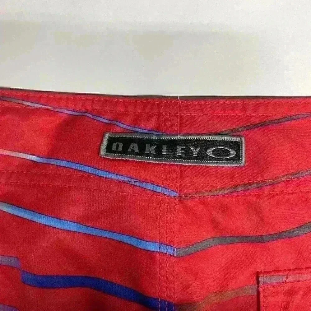 Oakley Board Shorts Men Size 32 Rainbow Stripe Performance Swim Trunks EUC‎